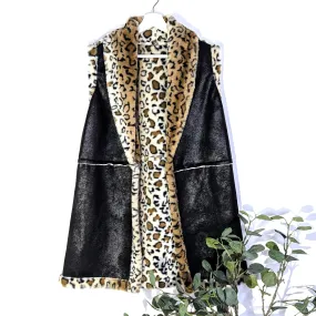 Faux animal fur lined 3/4 length with middle horizontal seam and pockets (M)
