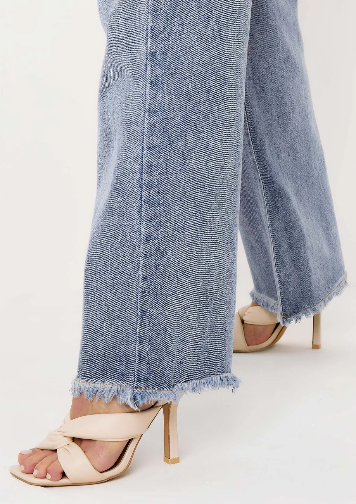 Phoebe Denim Light Wash Frayed Raw Hem Jeans