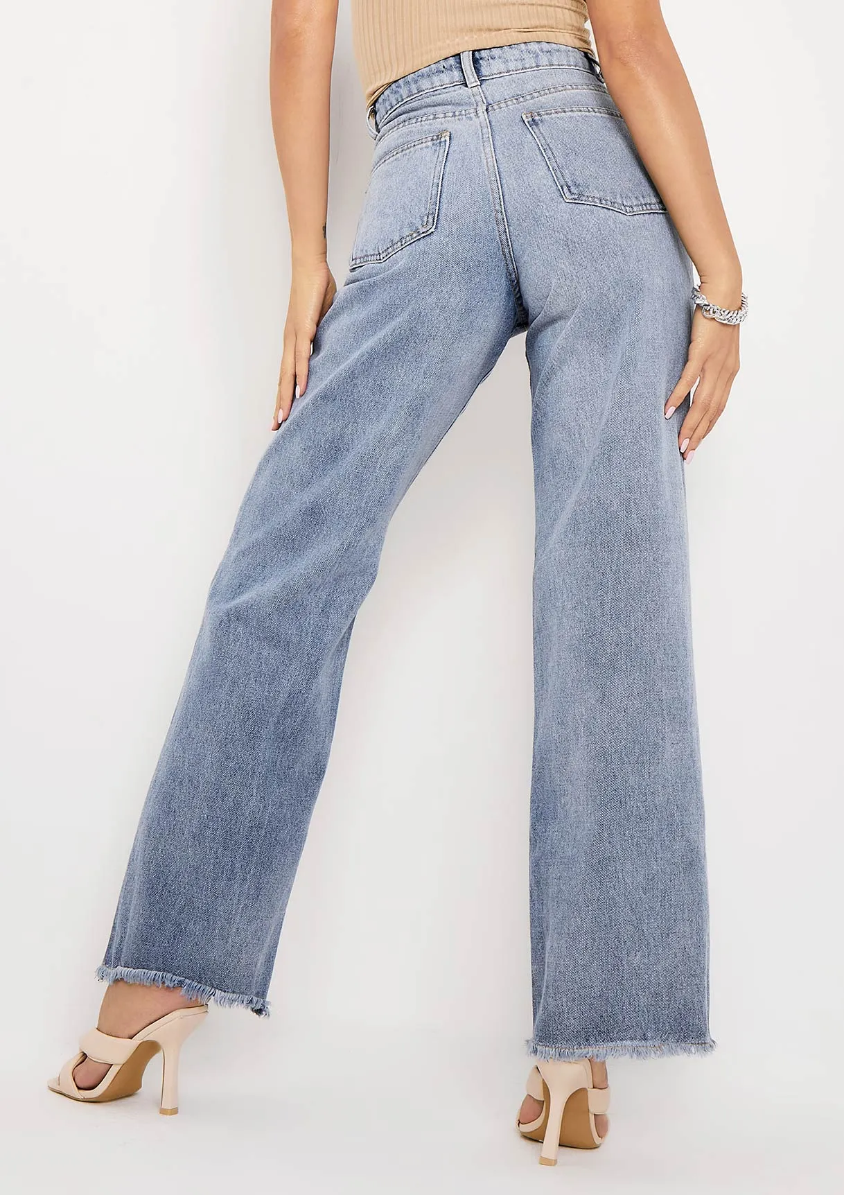 Phoebe Denim Light Wash Frayed Raw Hem Jeans
