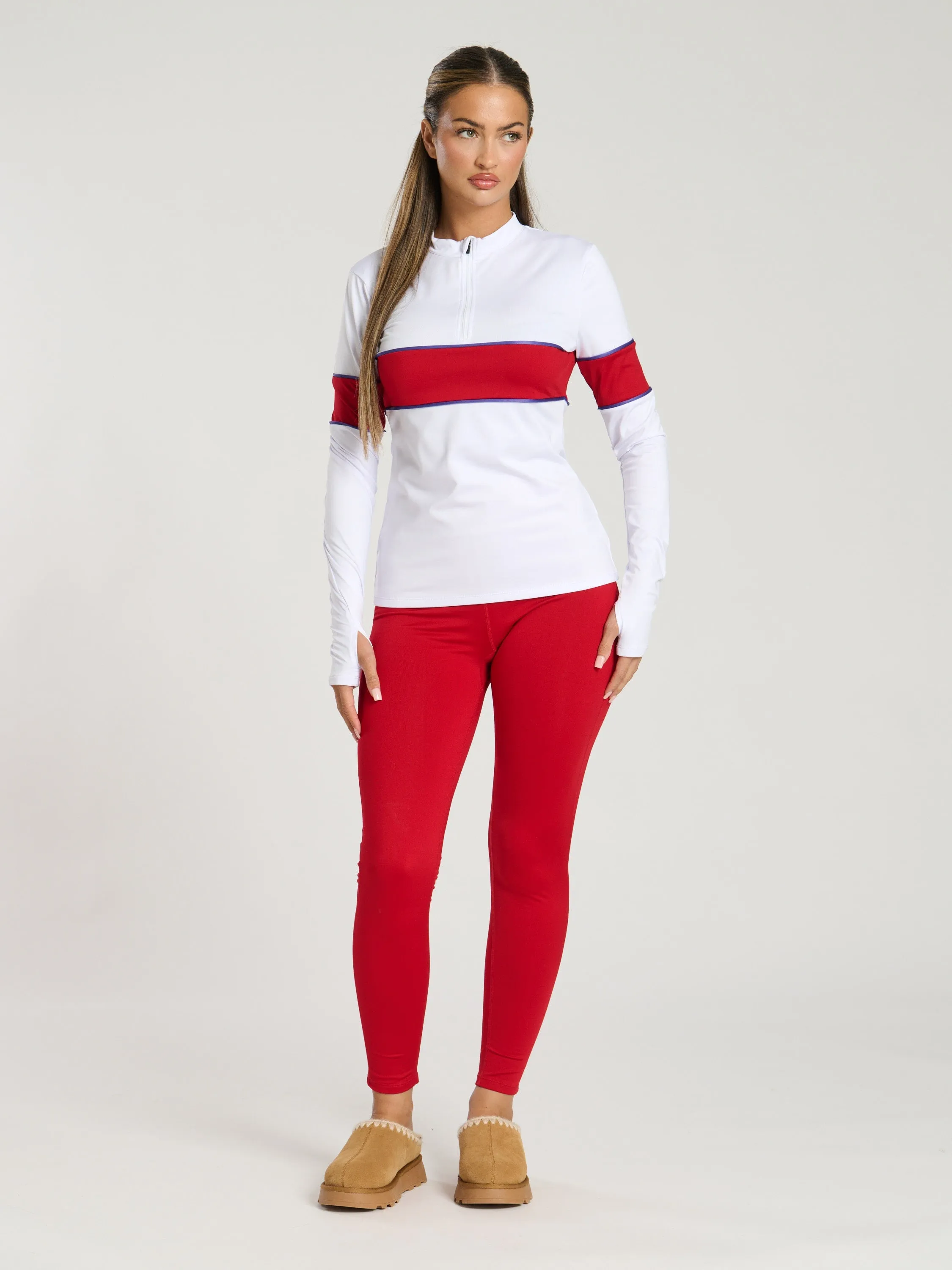 The 'Alpes' half zip base layer in cherry
