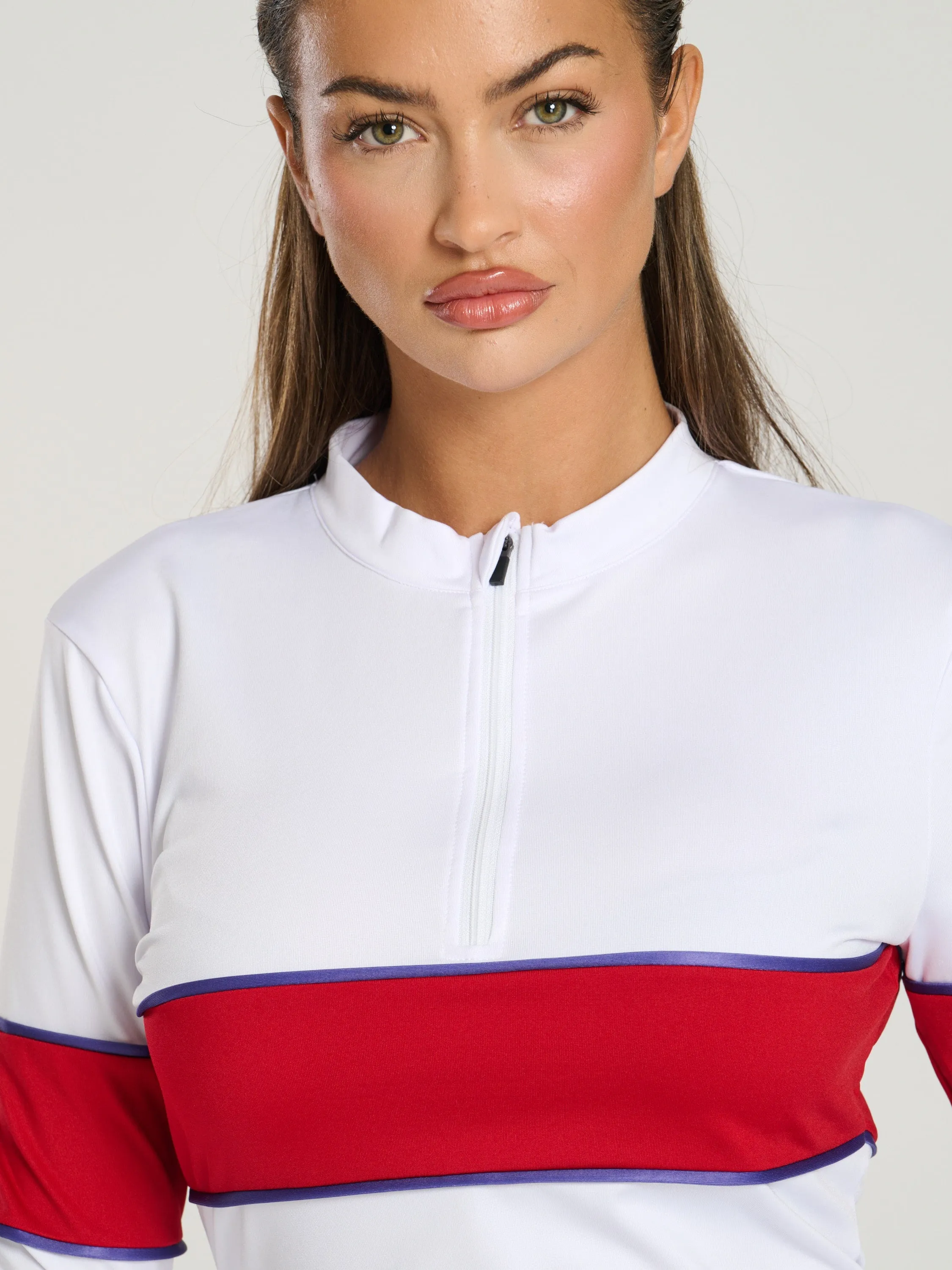 The 'Alpes' half zip base layer in cream