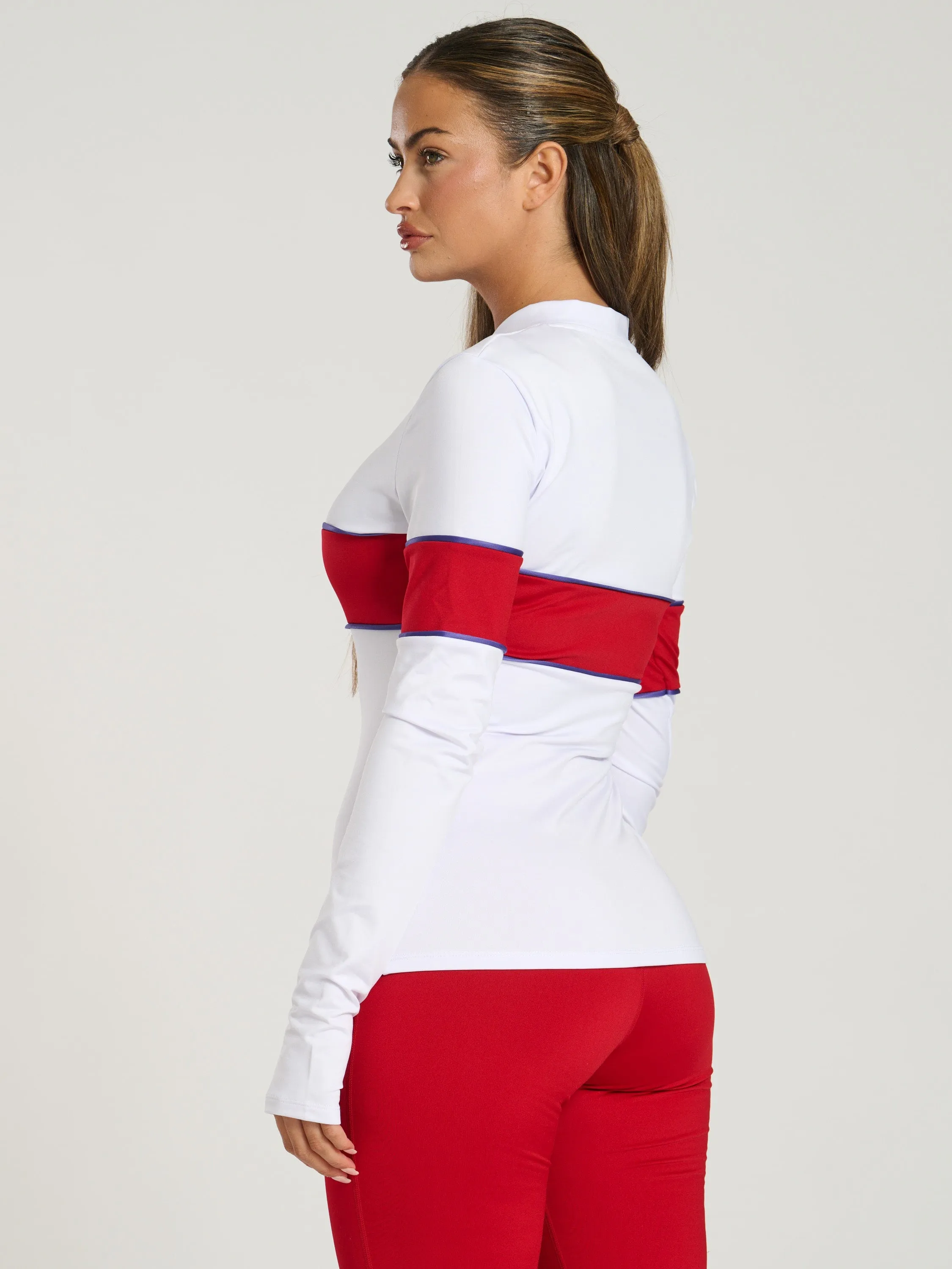 The 'Alpes' half zip base layer in cream